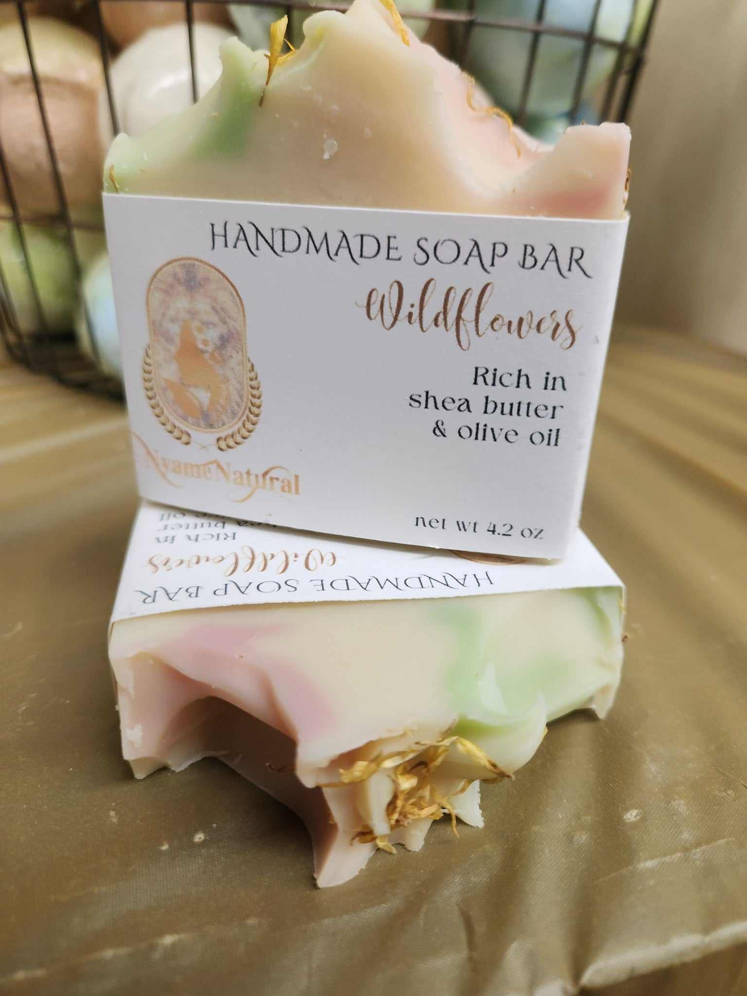 Handmade Wildflowers Soap Bar, enriched with shea butter and olive oil, placed on a neutral background.