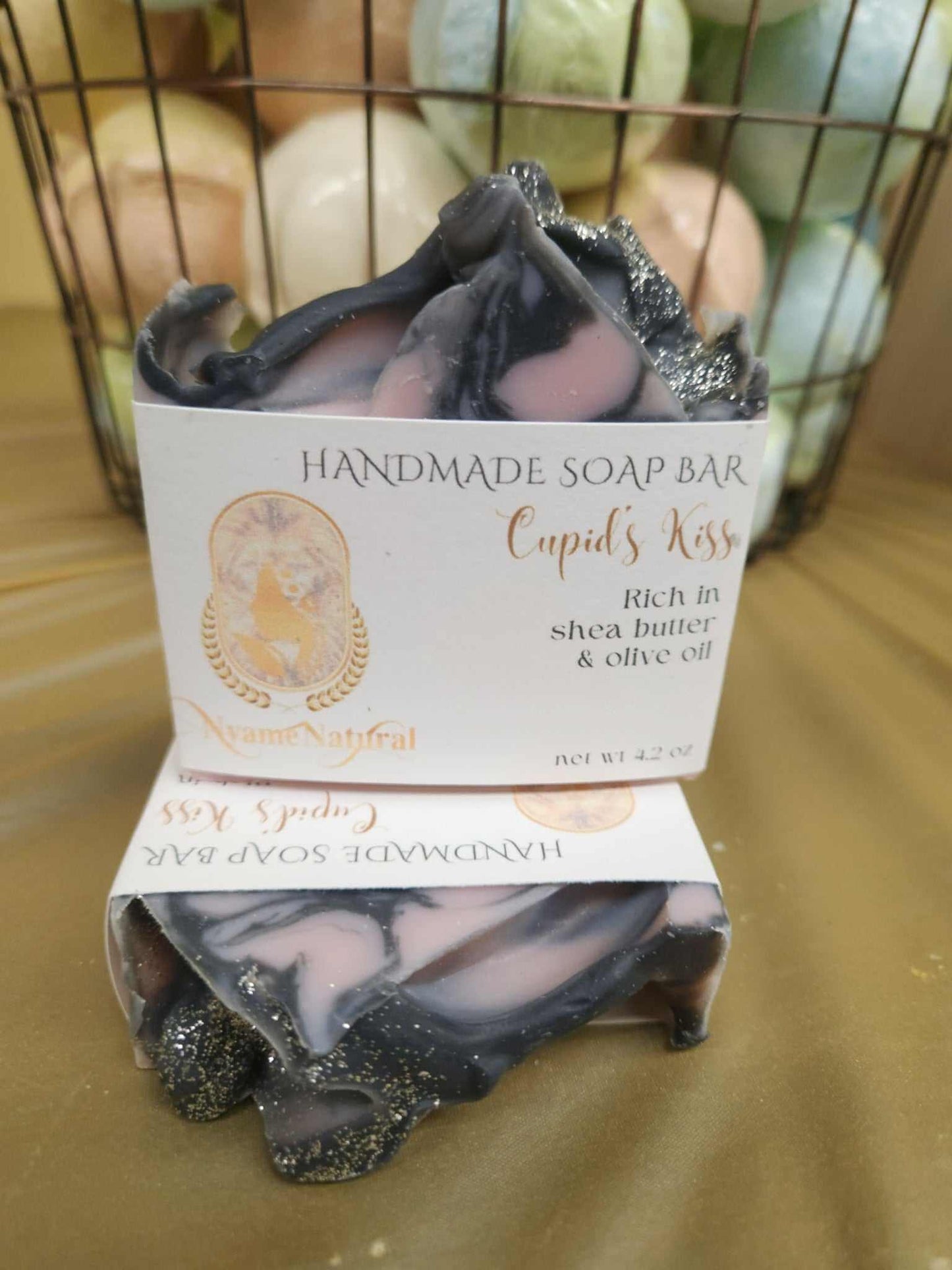 Handmade Cupid Kiss Soap Bar with shea butter and olive oil for a luxurious skin cleanse.