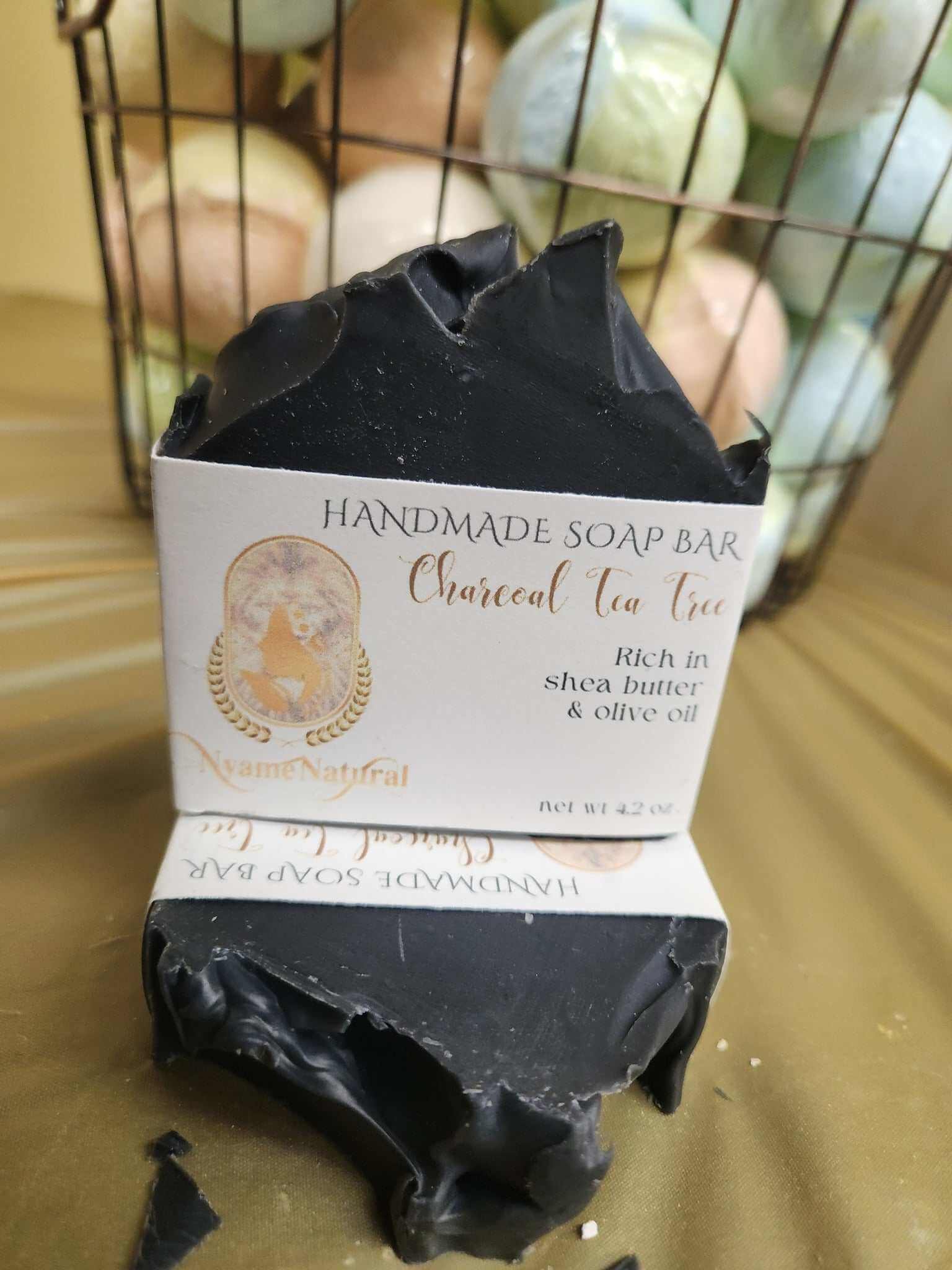 Handmade Charcoal Tea Tree soap bar rich in shea butter and olive oil for deep moisture and gentle cleansing.