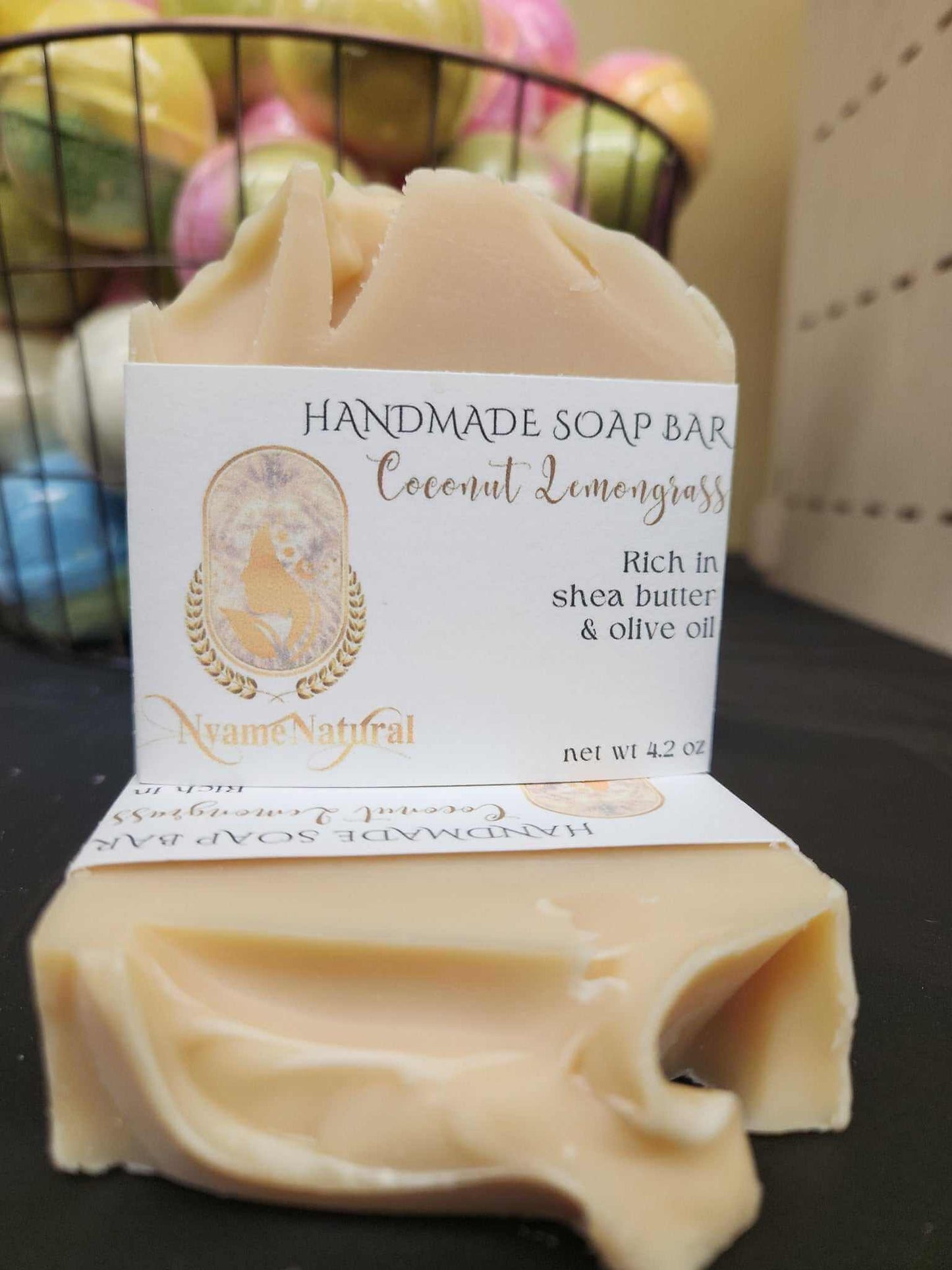 Handmade Coconut Lemongrass soap bar with shea butter and olive oil, perfect for nourishing skin and infused with invigorating scent.