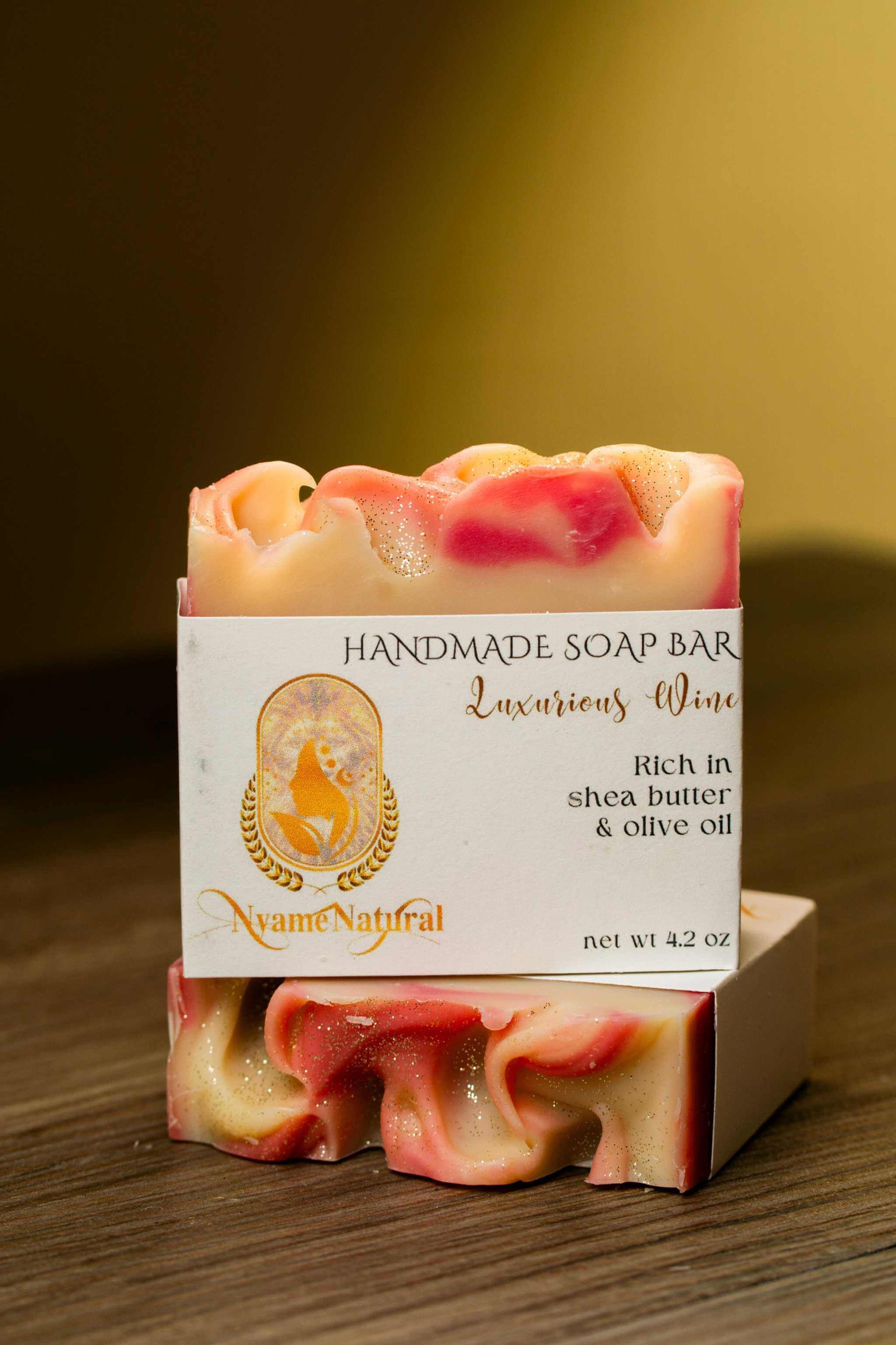 Luxurious Wine Bar Soap with shea butter and olive oil, handcrafted for a moisturizing bathing experience.