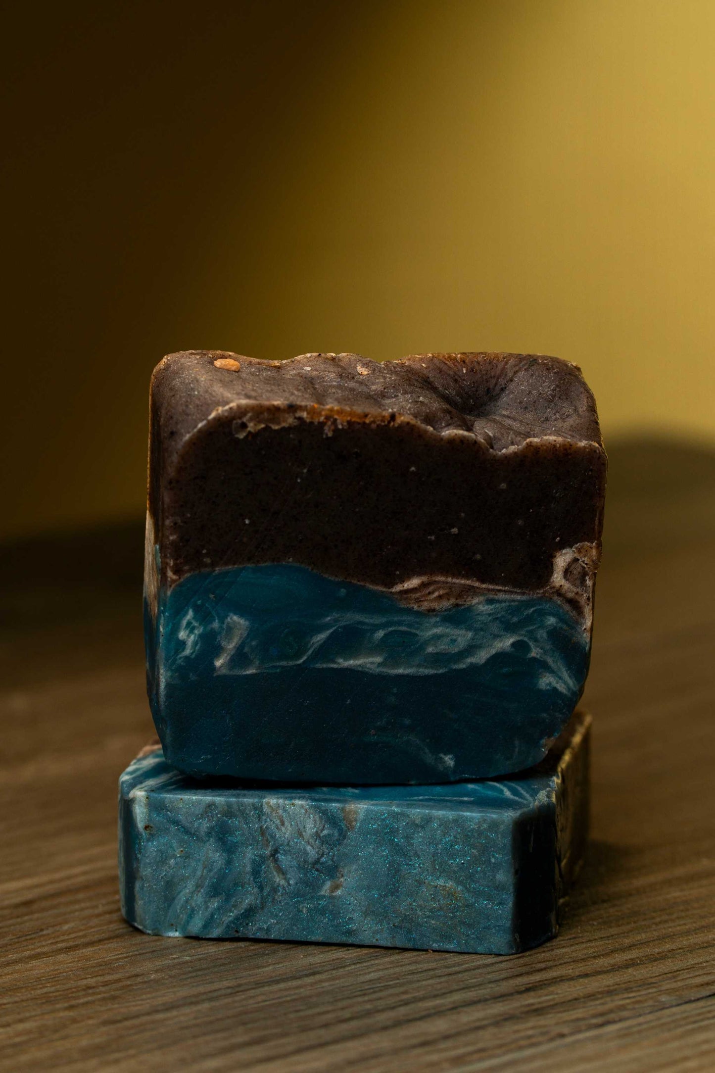 Beach Breeze Bar Soap featuring layers of dark and ocean-blue colors, ideal for nourishing hydration and cleansing.