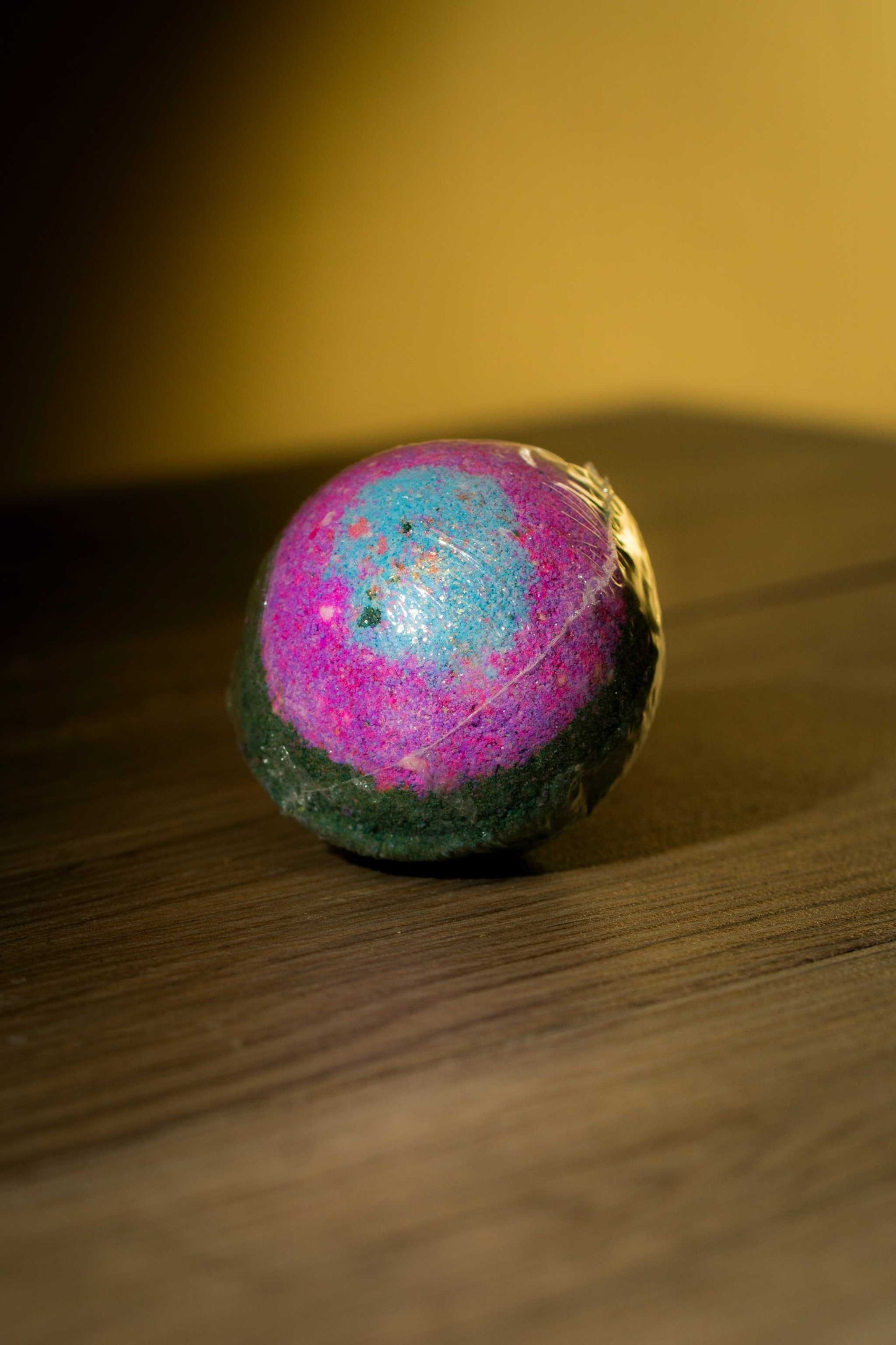 Luxurious Body Bath Bomb featuring vibrant colors and unique design, perfect for a soothing bath experience.