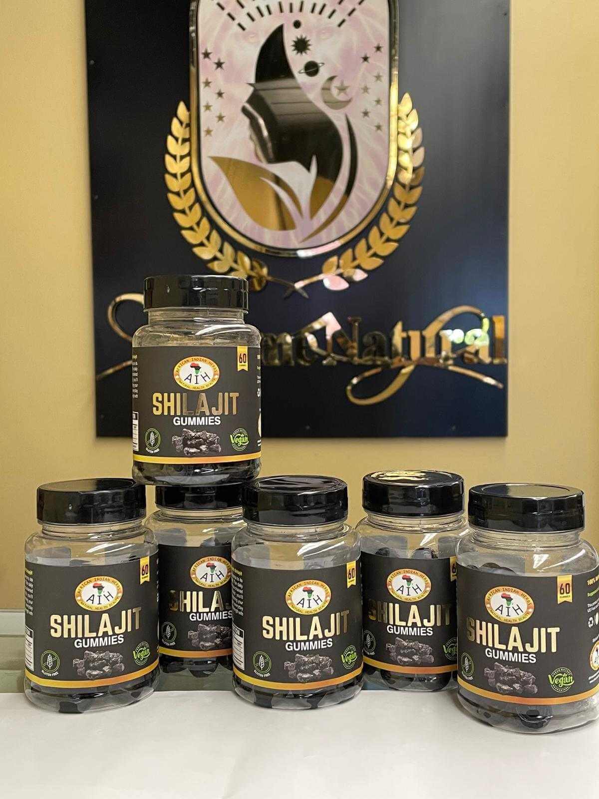 AIH Shilajit Gummies bottles on display, promoting energy boost and mineral absorption.