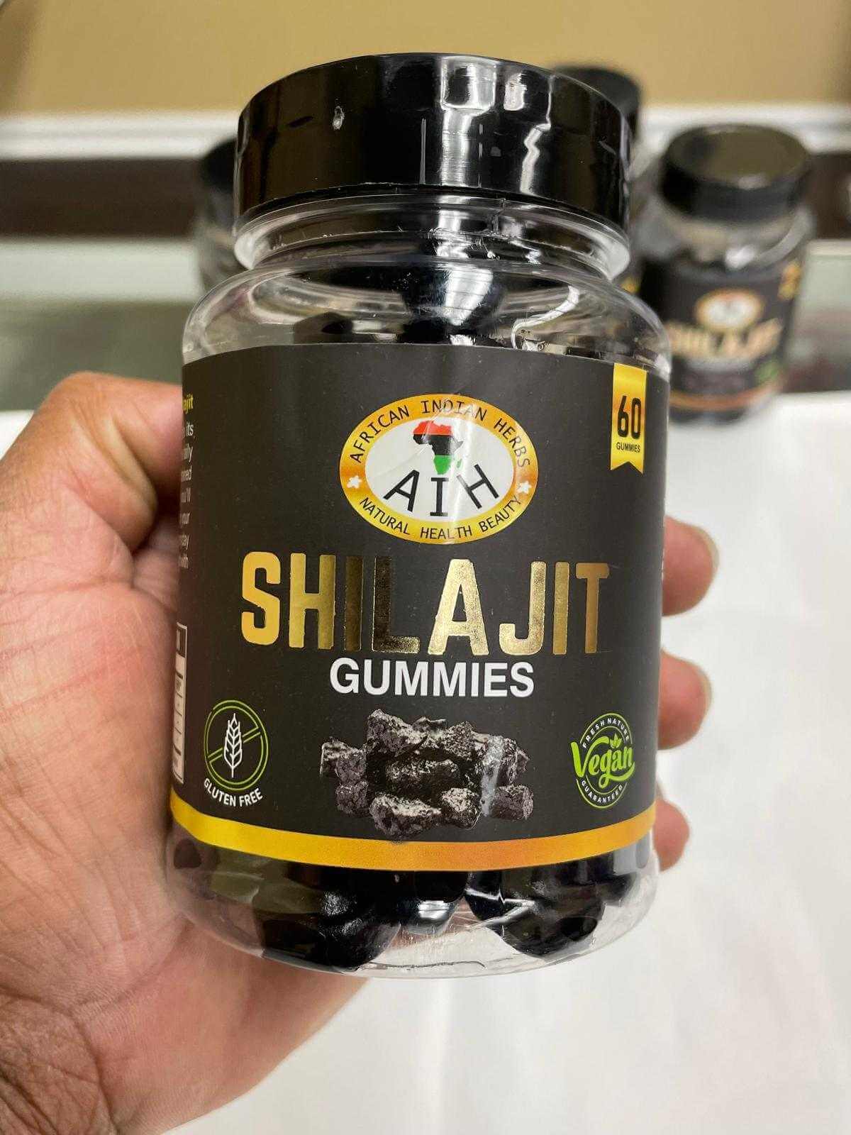 AIH Shilajit Gummies in a clear bottle, promoting energy boost and cognitive clarity, gluten-free and vegan.