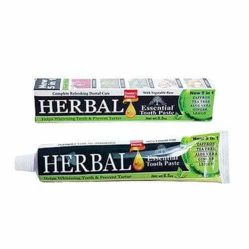 Herbal Essential Toothpaste tube showcasing natural ingredients like Zaffron, Tea Tree, Aloe Vera, and Ginger for oral hygiene.