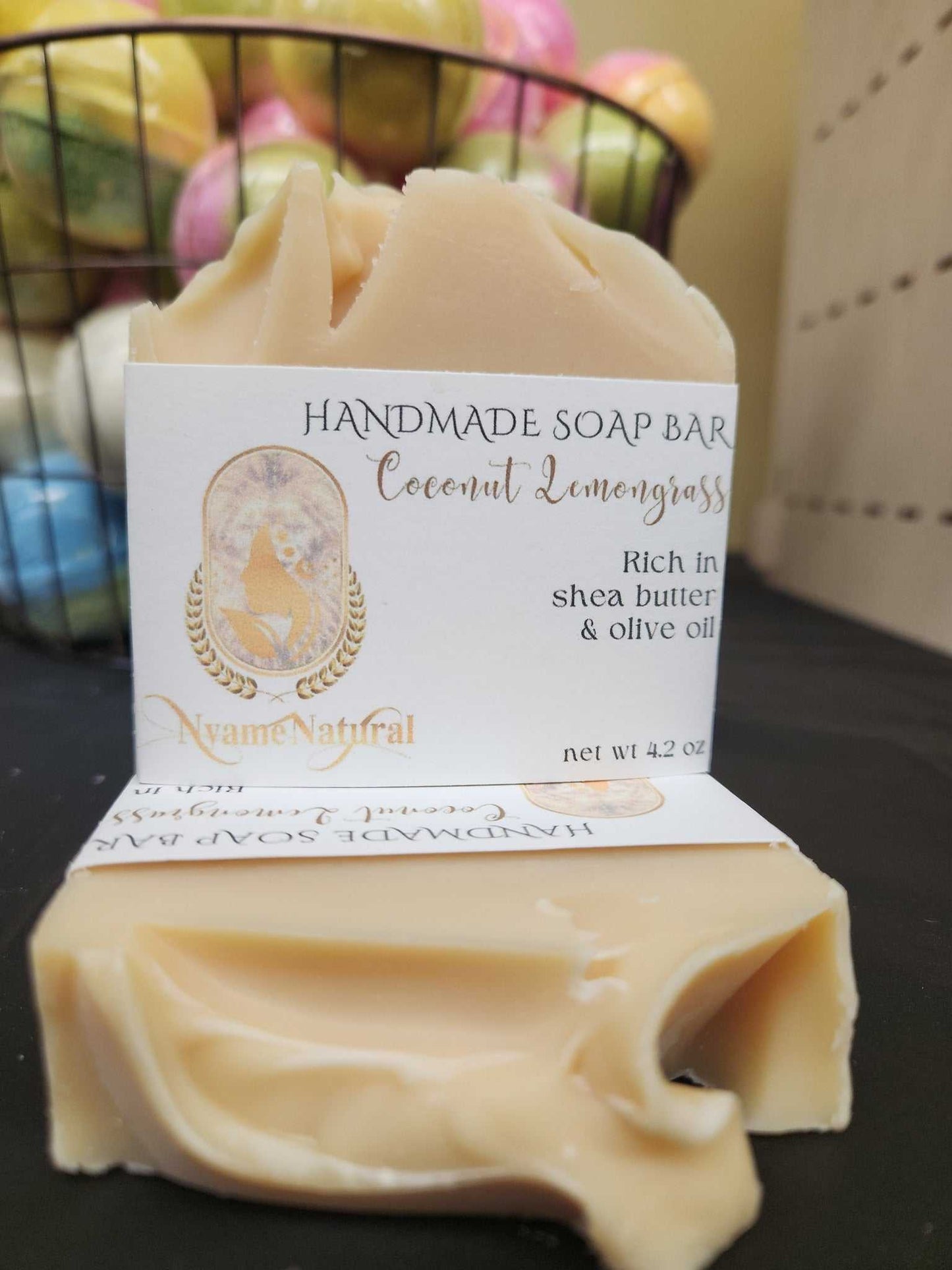 Handmade Coconut Lemongrass soap bar with shea butter and olive oil, perfect for nourishing skin and infused with invigorating scent.